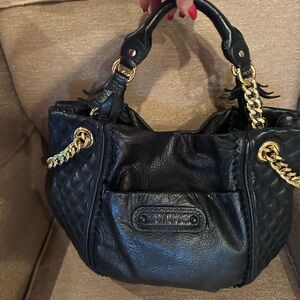 Beautiful vintage leather, black juicy tour bag